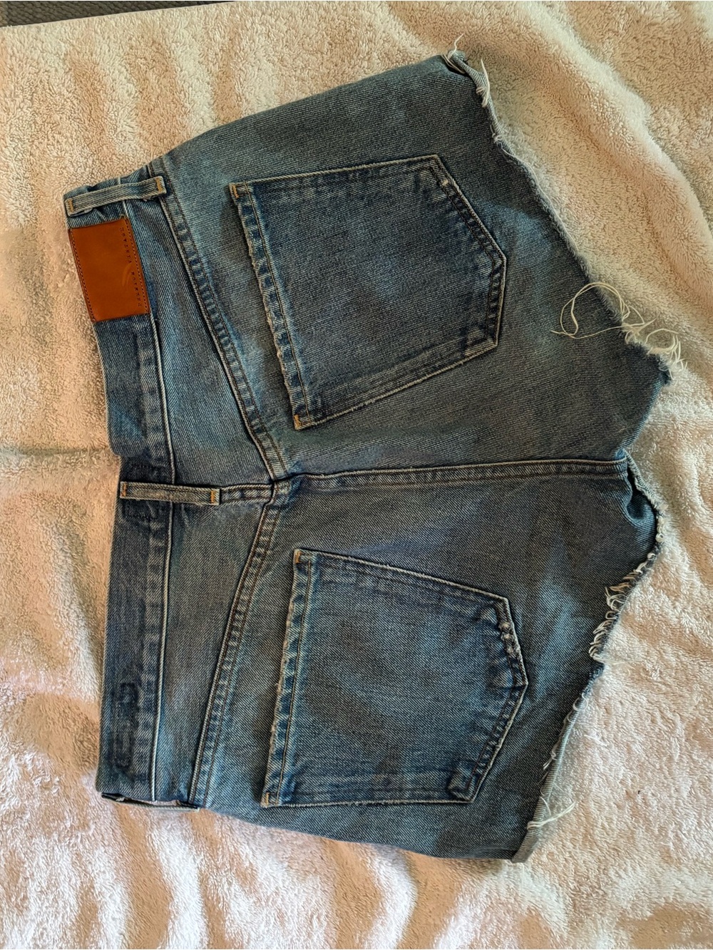 Denim Cutoff Shorts in Medium Blue